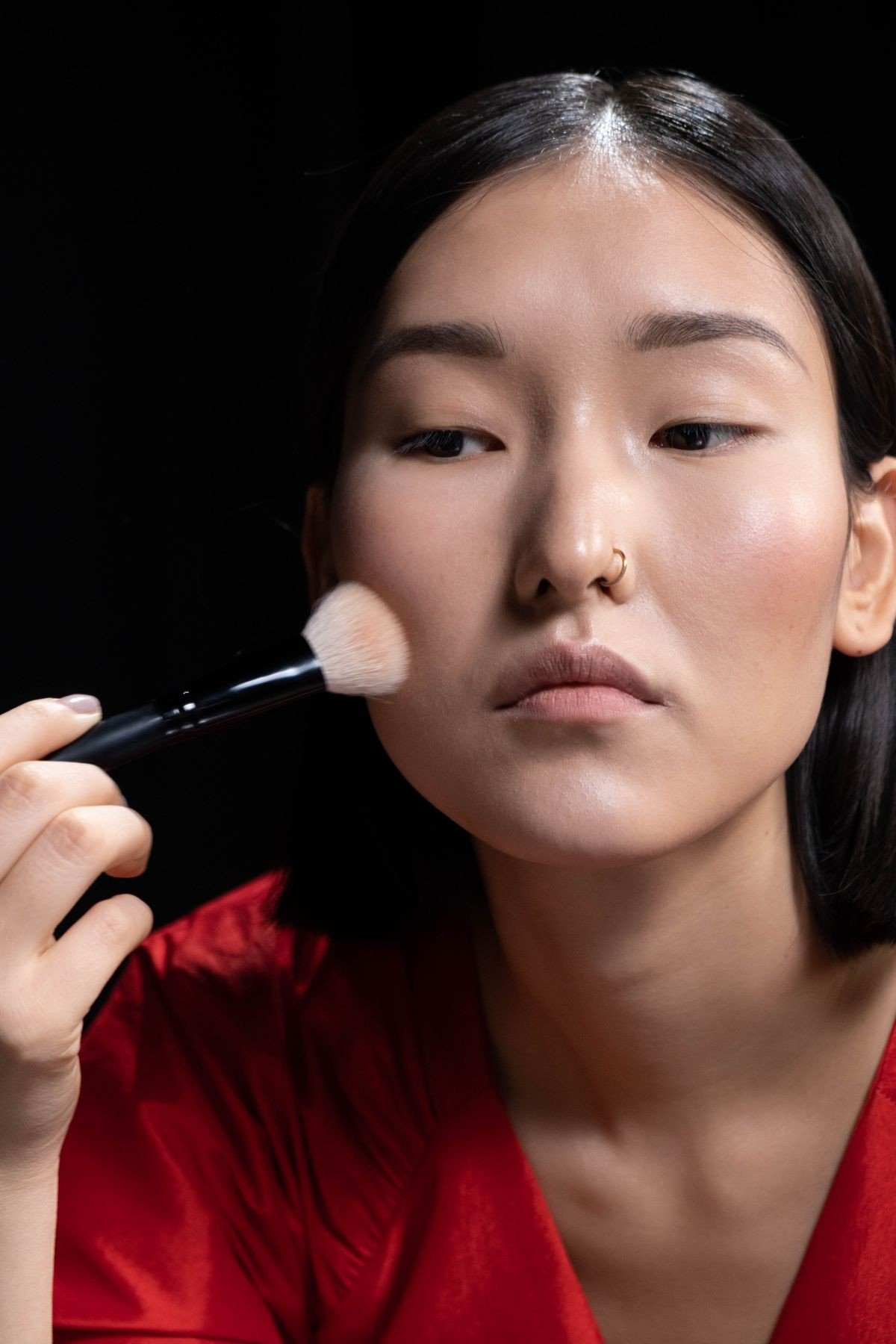 Mauve blush makeup for mature skin with a soft glow