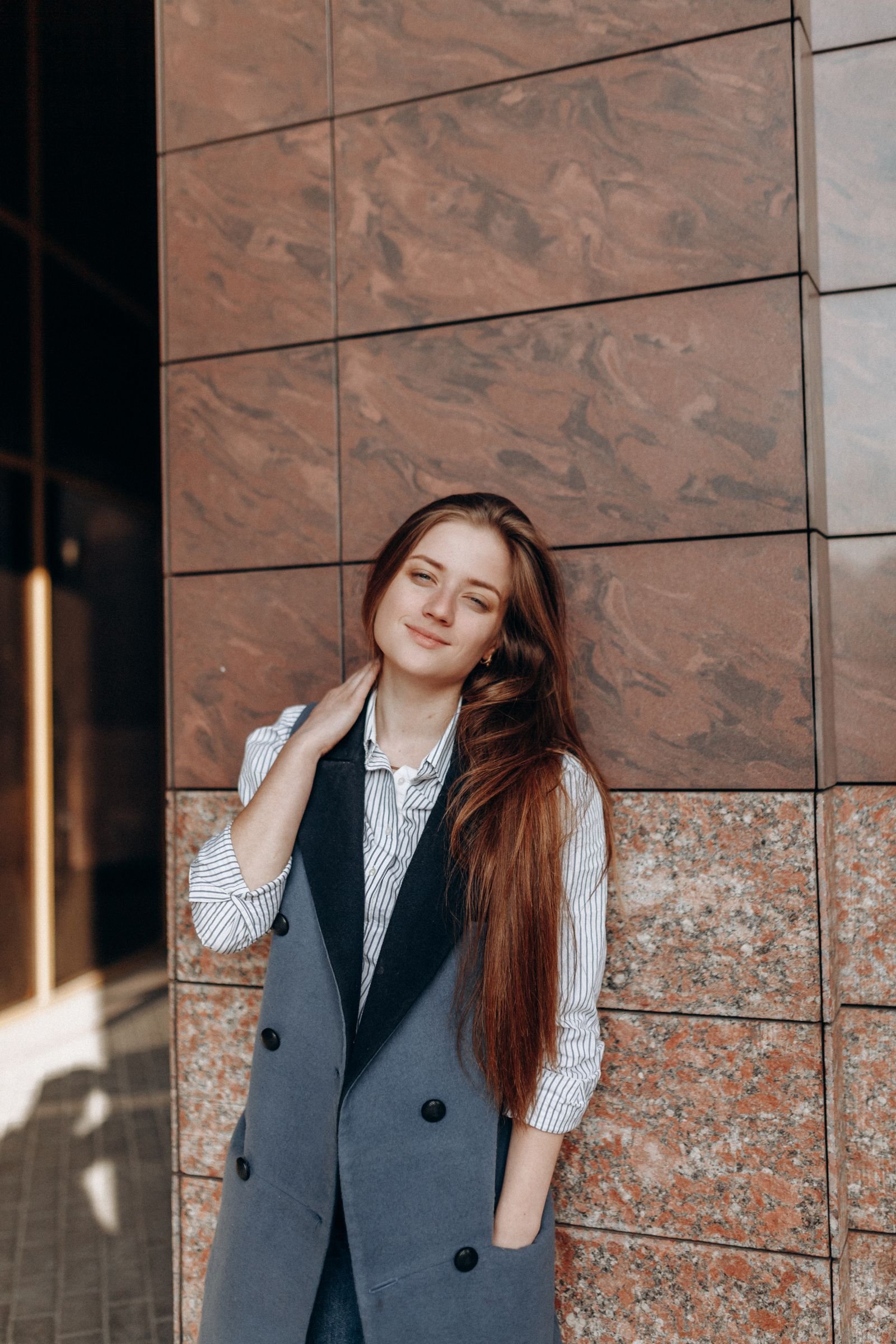 Elegant lady in black cape coat for evening autumn styling
