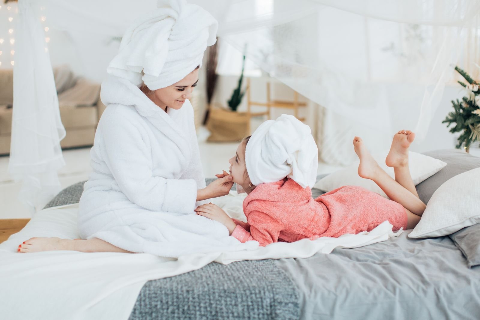 Cosy hooded poncho cape styled like a warm bathrobe layer