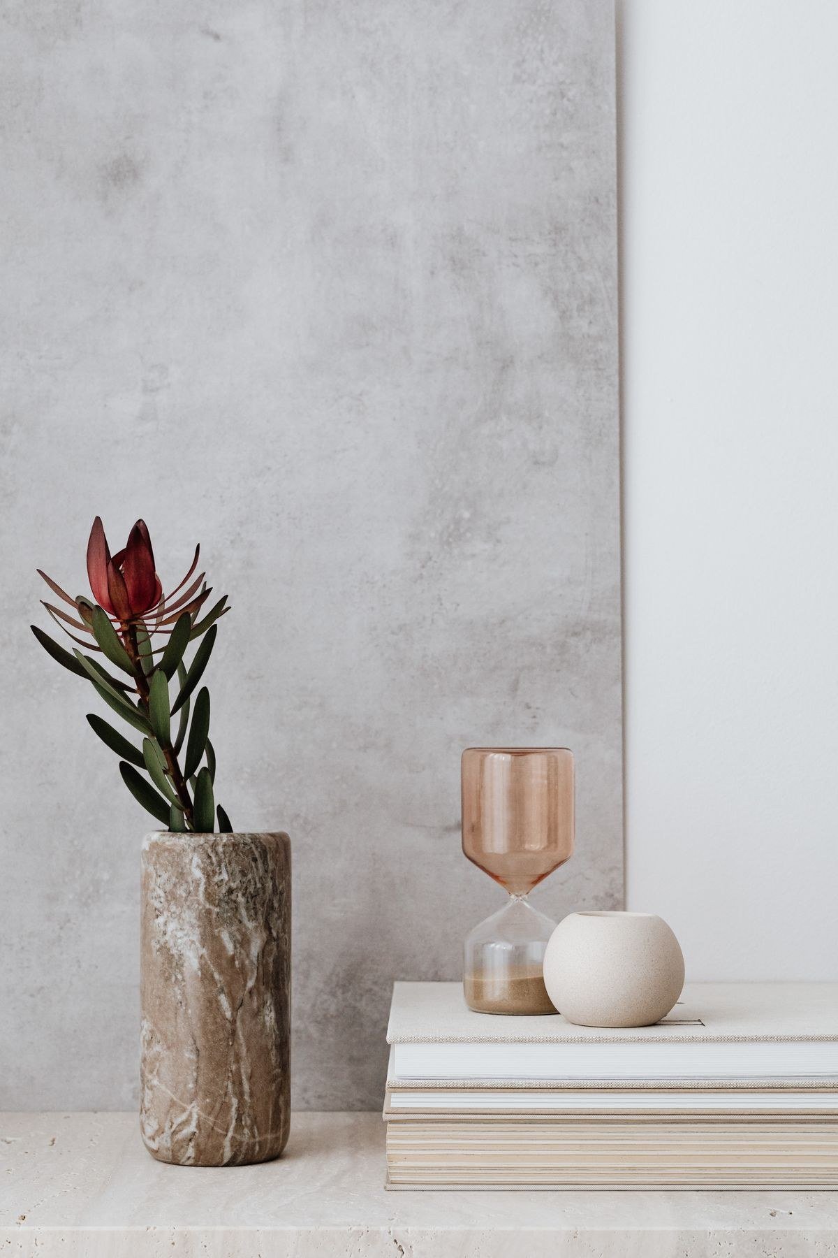 Warm minimalist fall bathroom with eucalyptus and amber candle