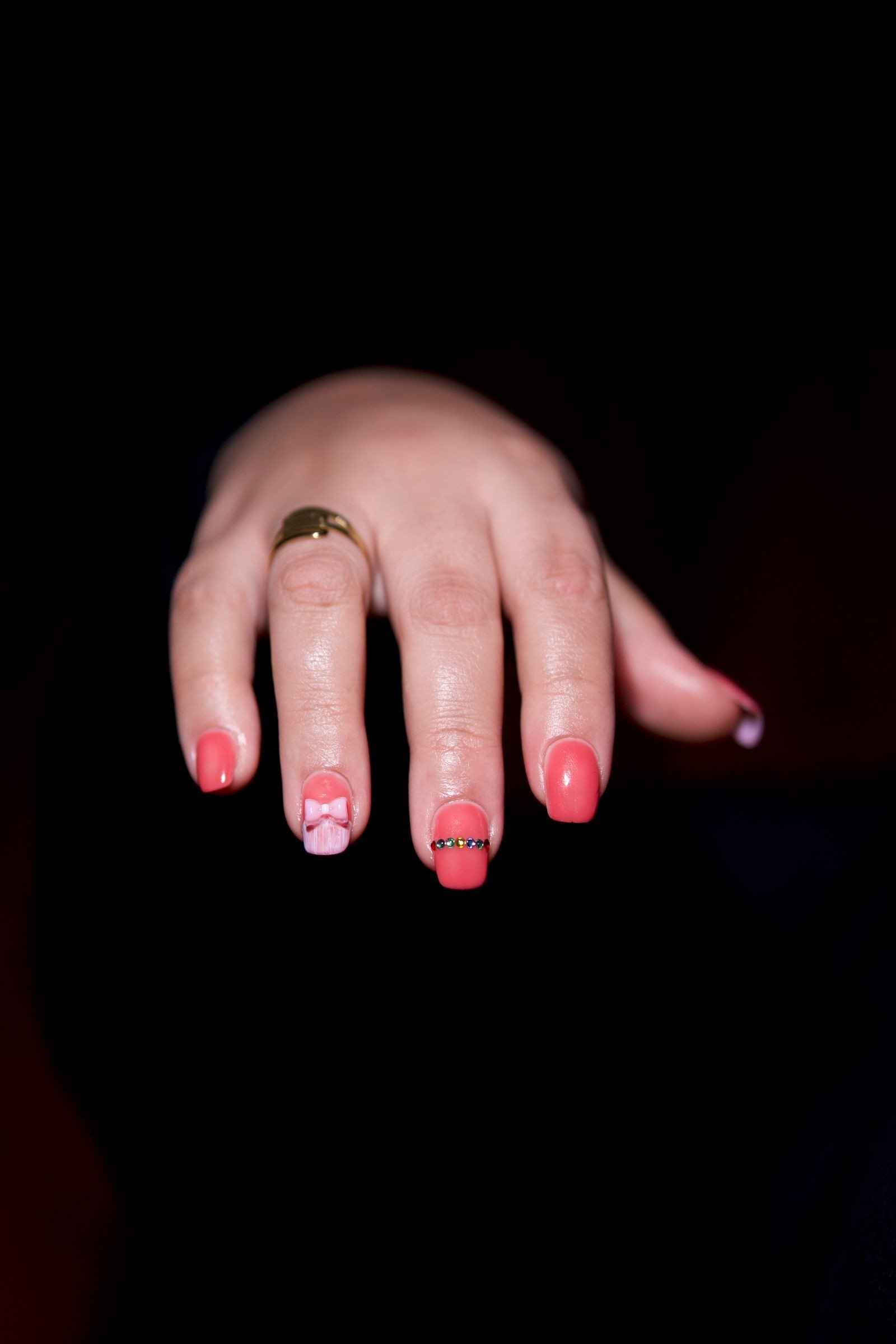 French tip nails with a small dragonfly accent