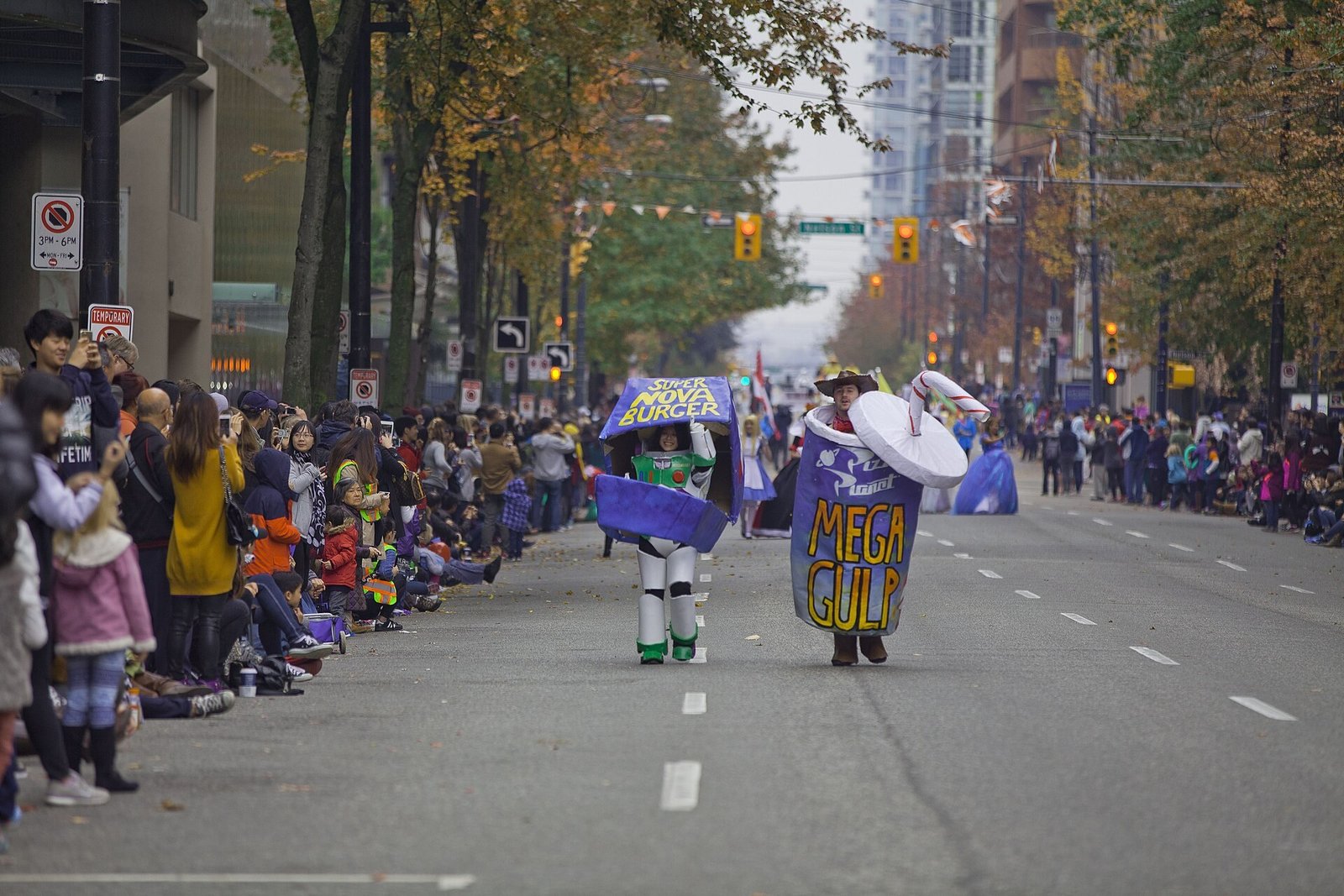 Kid in Buzz Lightyear space ranger costume with wings