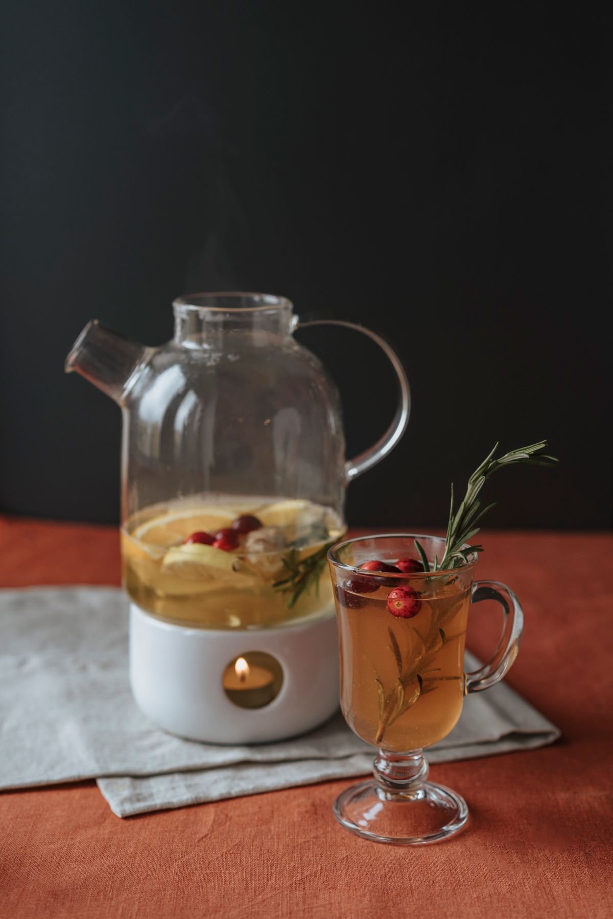 Ice ring with cranberries and oranges keeping Thanksgiving punch cold