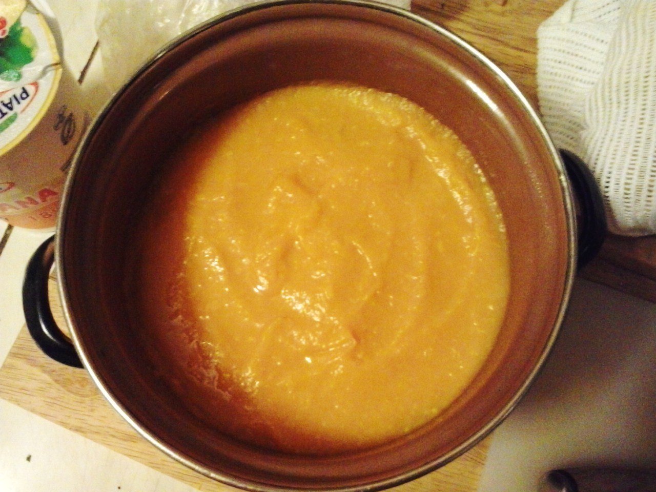 Caramelised roasted pumpkin chunks on a baking tray for soup