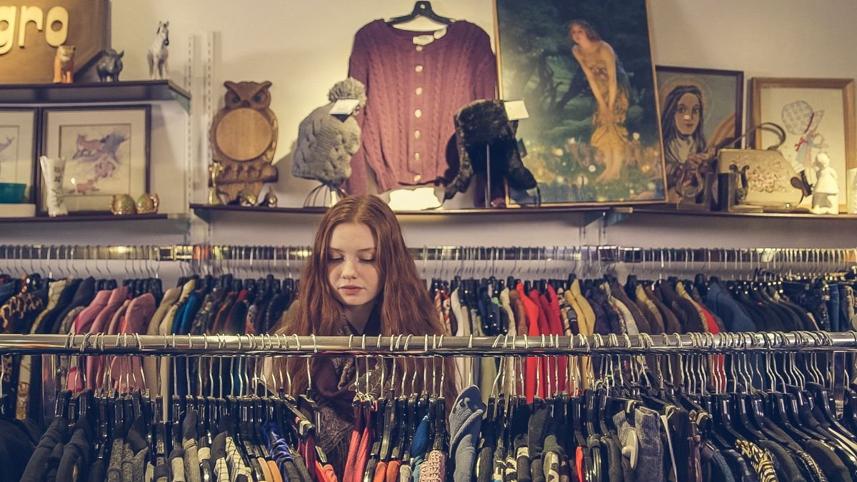 Designer brand clothing and handbags found at thrift store prices