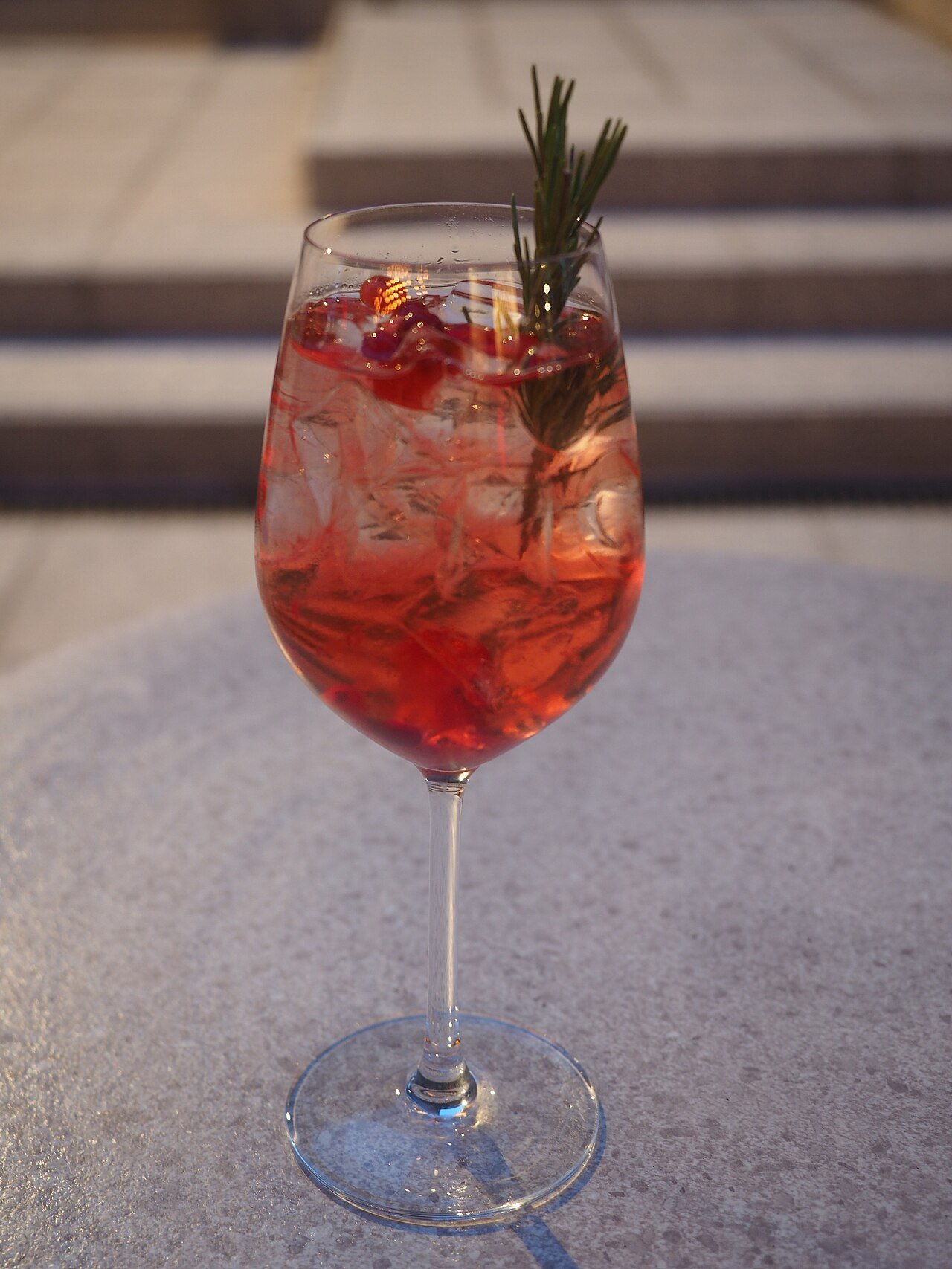 A red berry spritz with vibrant color