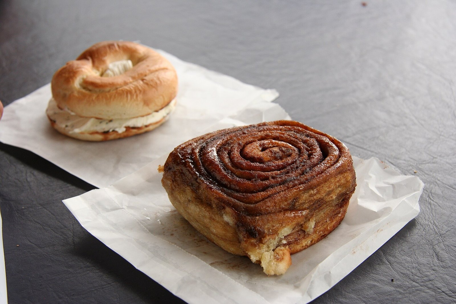 Freshly baked apple butter cinnamon rolls with cream cheese frosting
