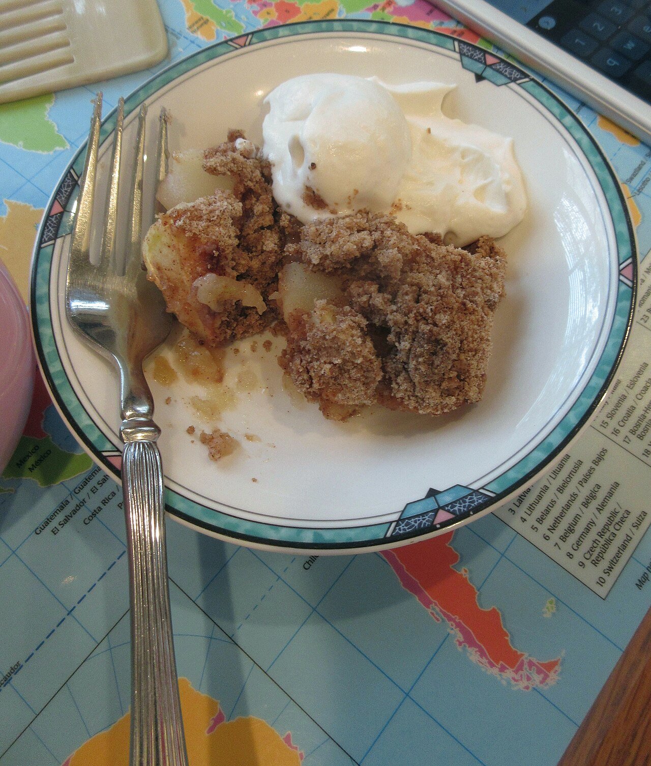 A fresh-baked cranberry apple crisp, golden and bubbling