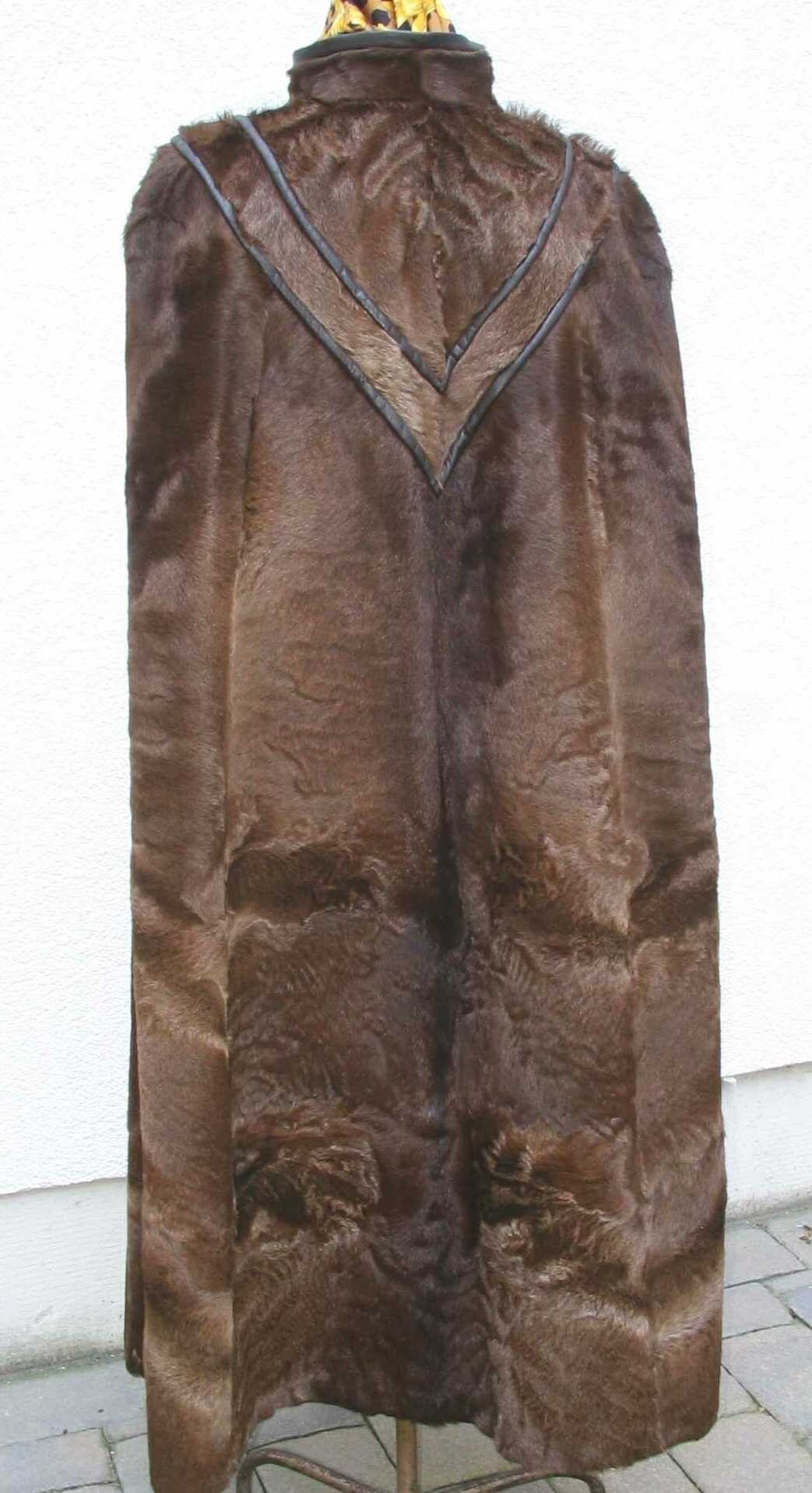 Capes Over Jeans and Boots for Cape outfit ideas