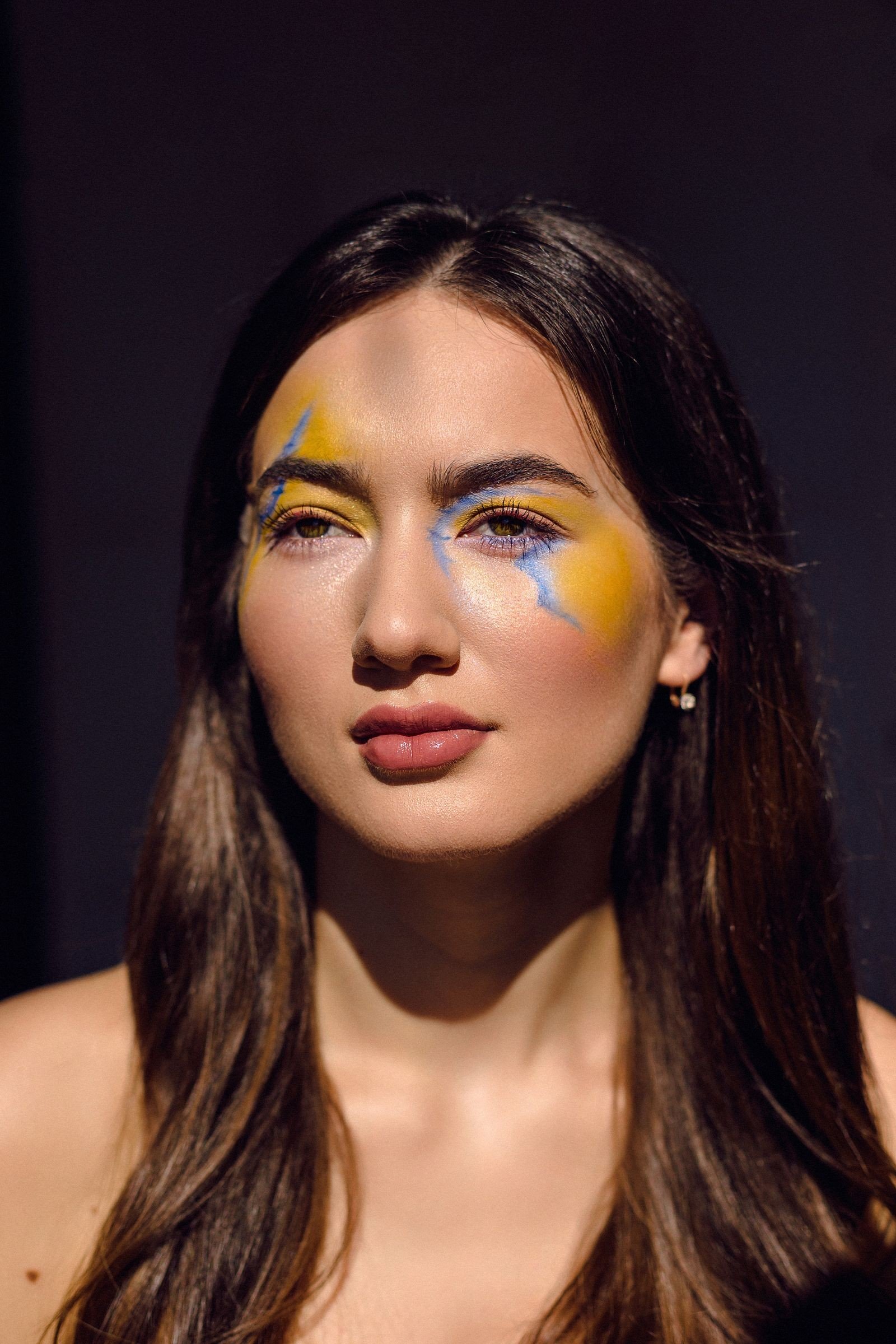Eccentric makeup tools brushes and bold colours