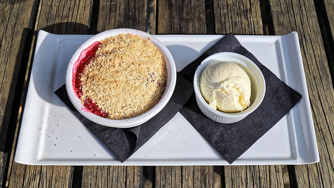 Warm crumble served with ice cream, the classic pairing