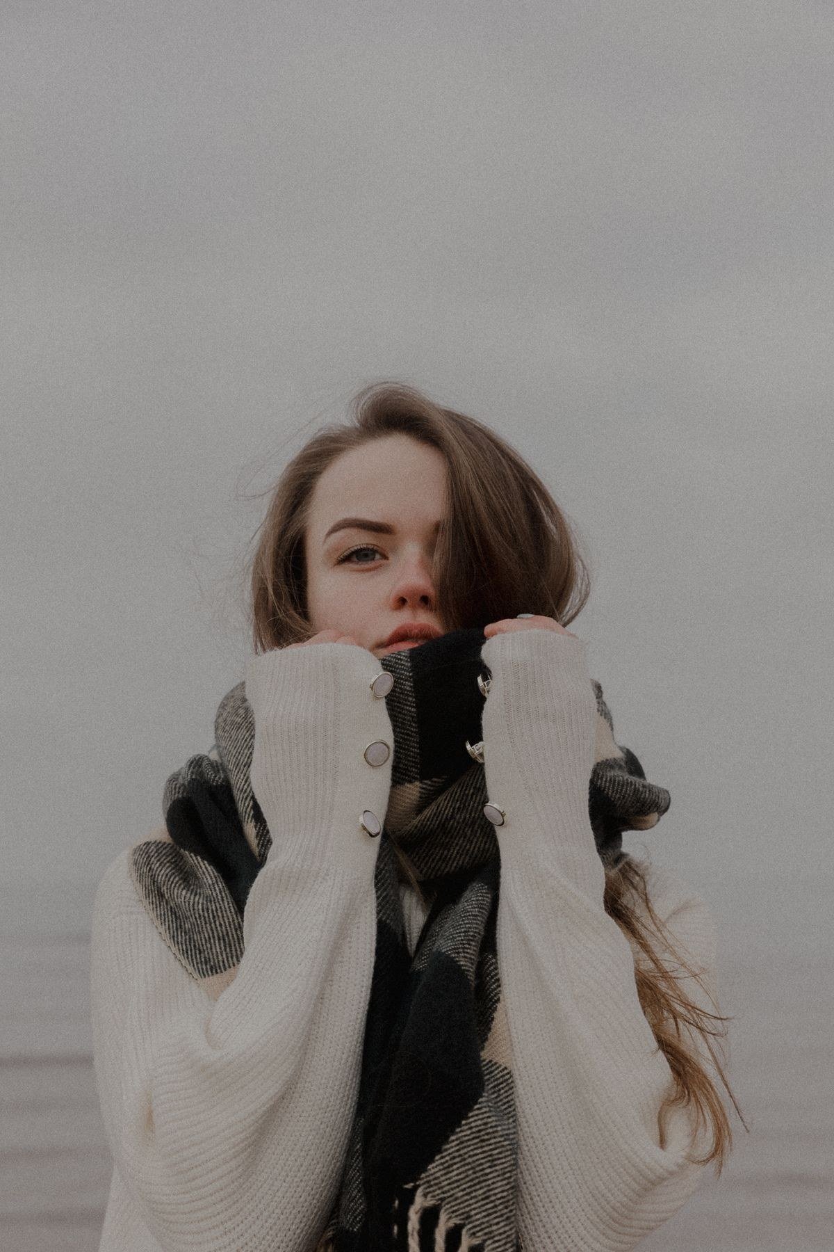 Oversized scarf coat over relaxed tailored trousers