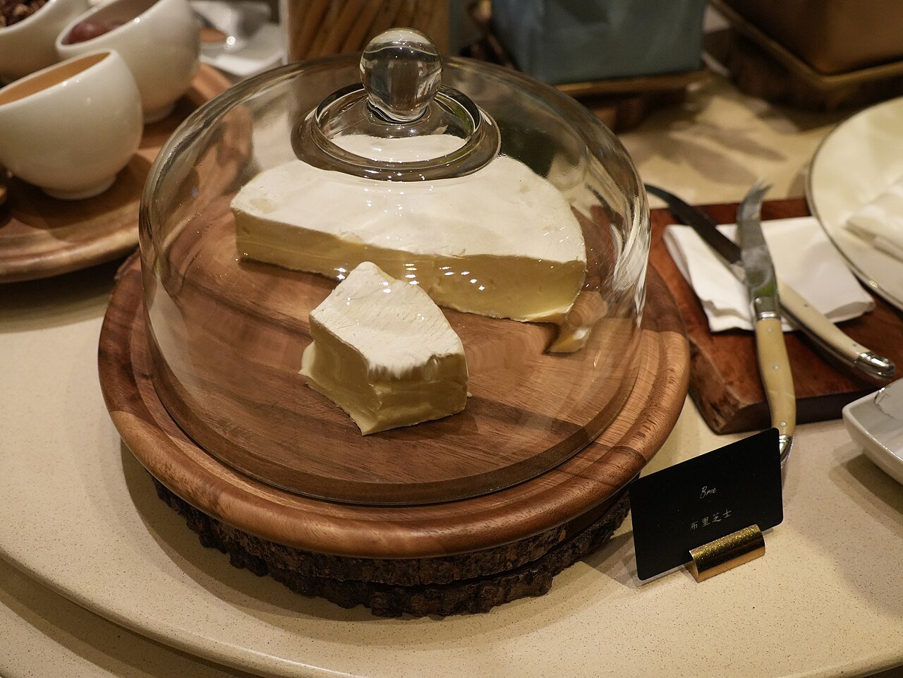 A ripe, creamy wheel of brie, the star of the show