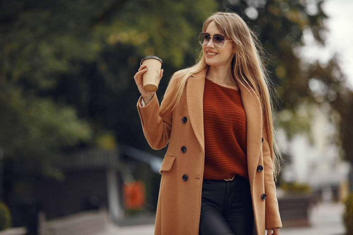 Scarf coat layered over a midi dress