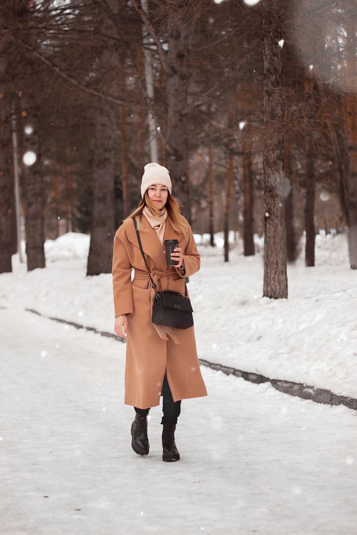 Neutral tonal outfit with cream and grey layers