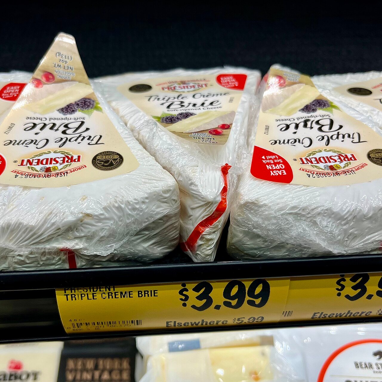 Brie cheeses ready to be cubed for the bites