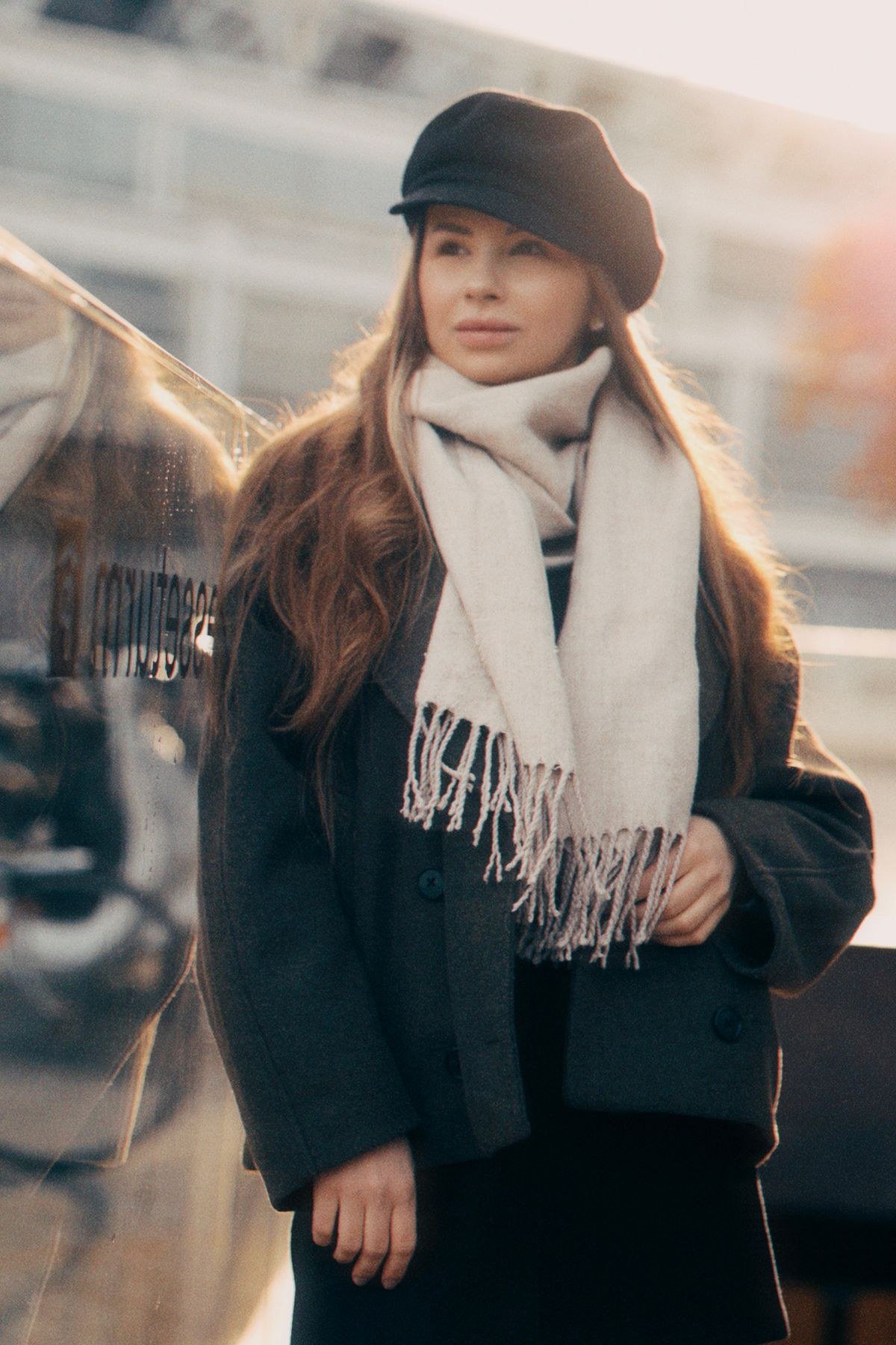 Festive scarf coat outfit with metallic accessories