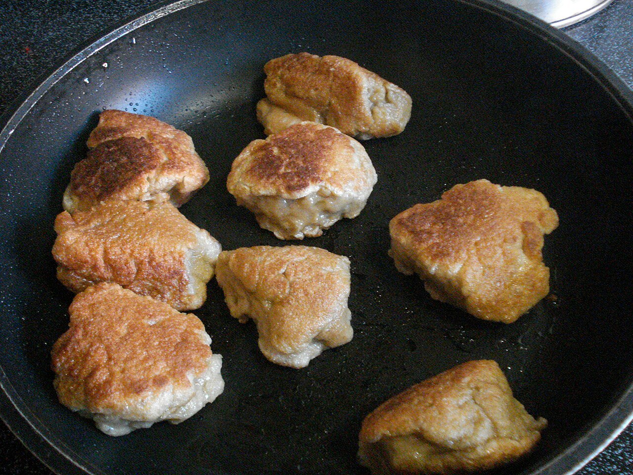 Close-up of savory cooked seitan pieces ready for dinner