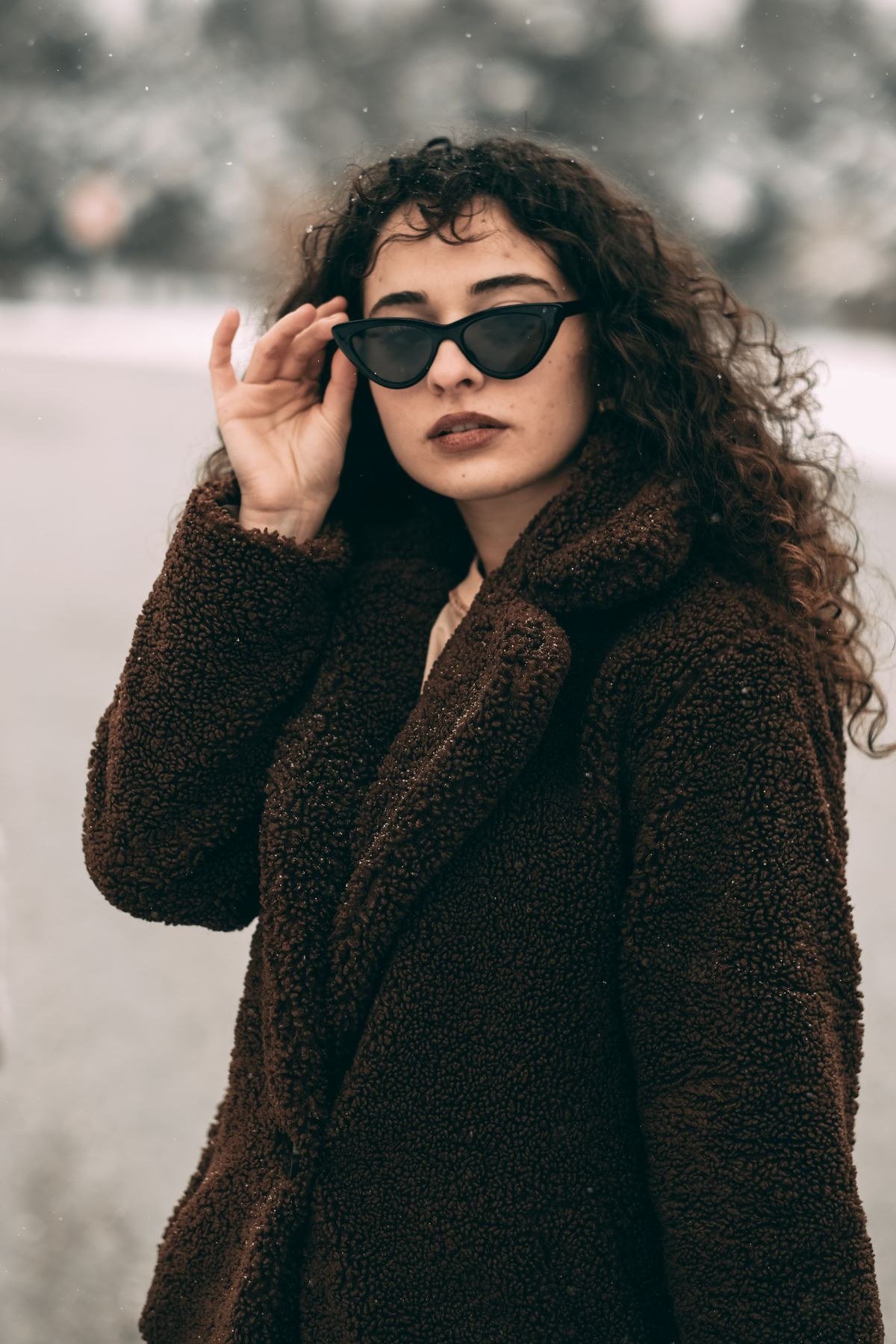 Black faux fur coat for evening glamour