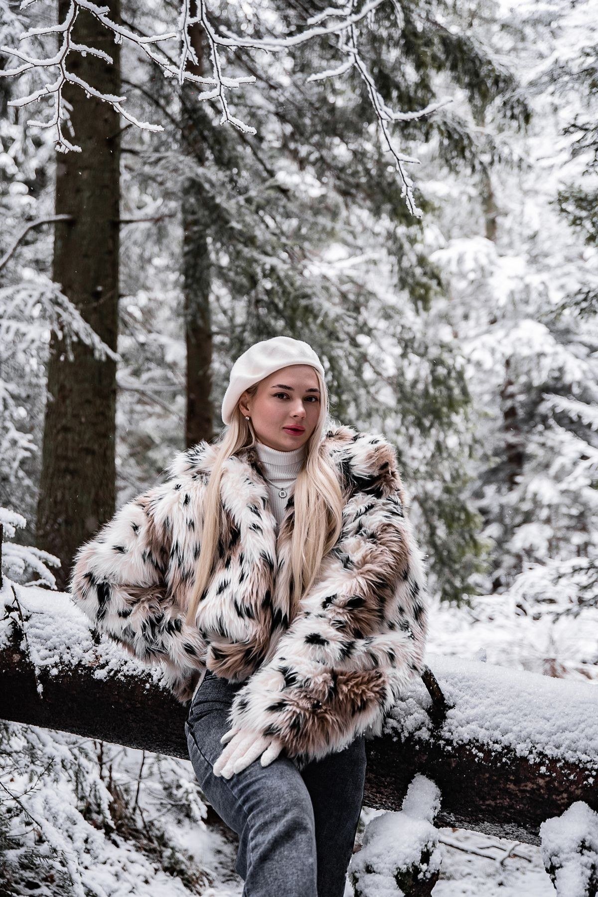 Oversized faux fur coat with slim trousers