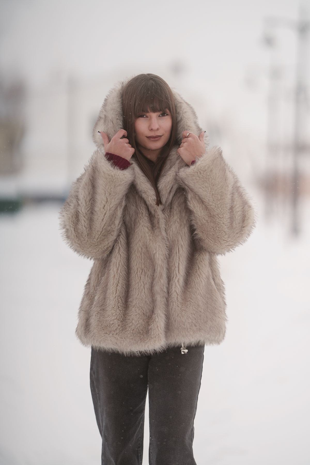 Shearling coat styled over office tailoring