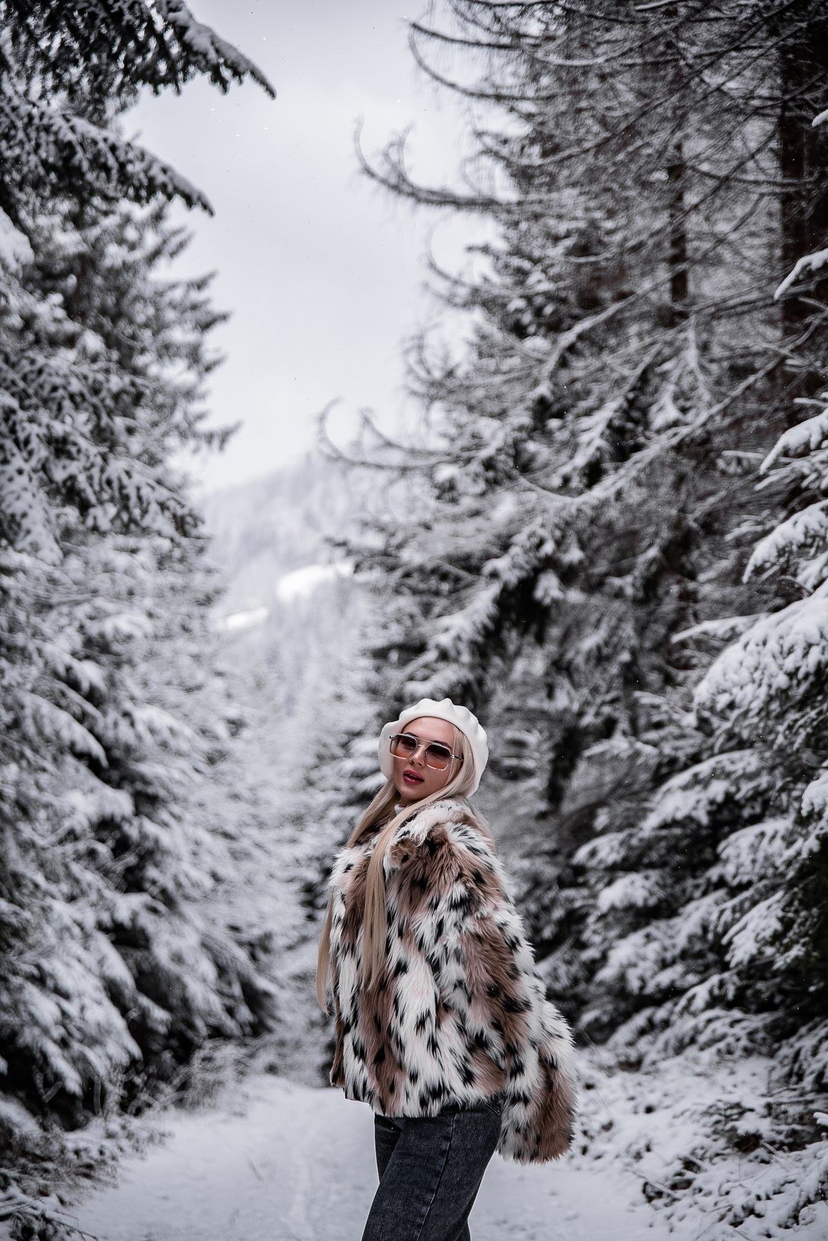 Faux fur coat in snowy winter weather