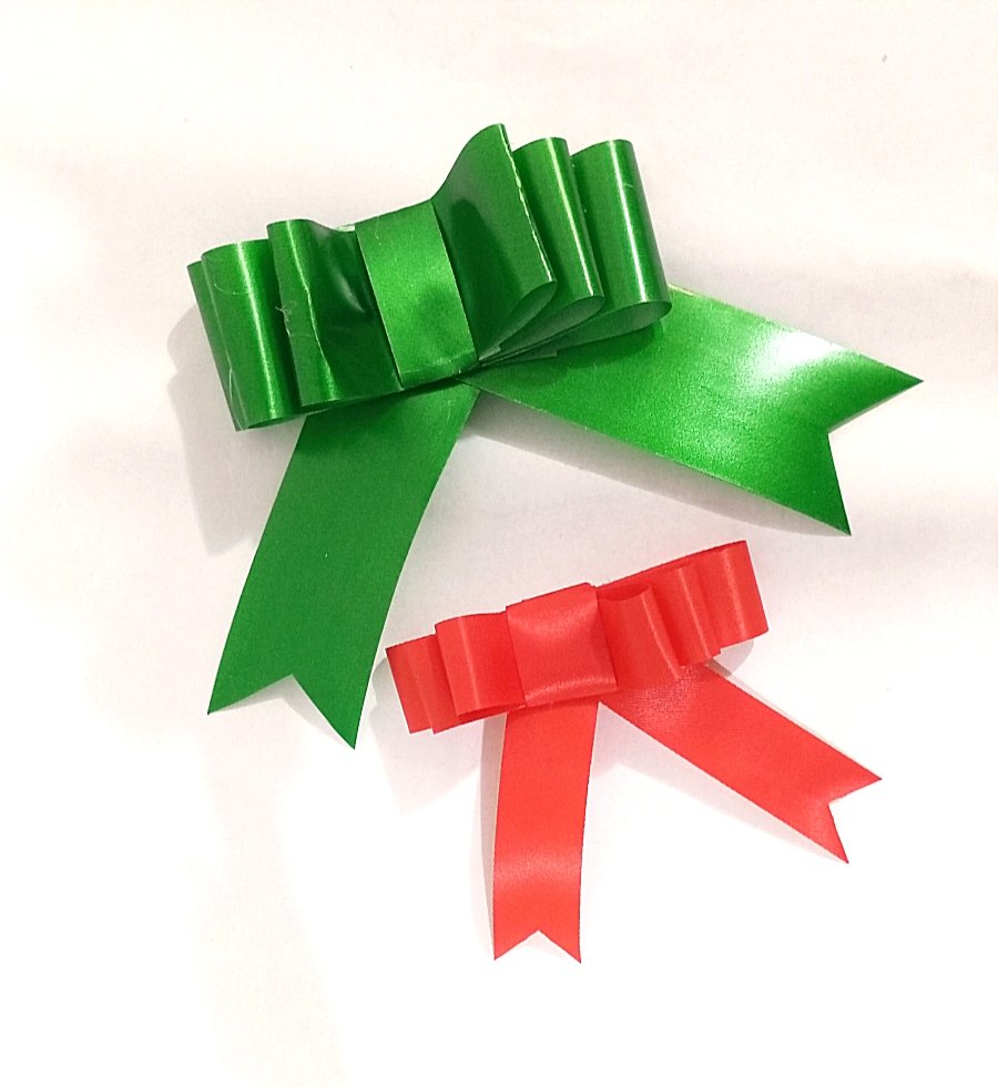 Spools of velvet ribbon in Christmas colors and widths