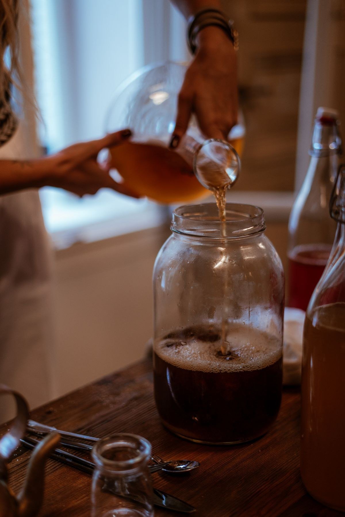 Comparing a healthy kombucha SCOBY with one showing signs of mold contamination