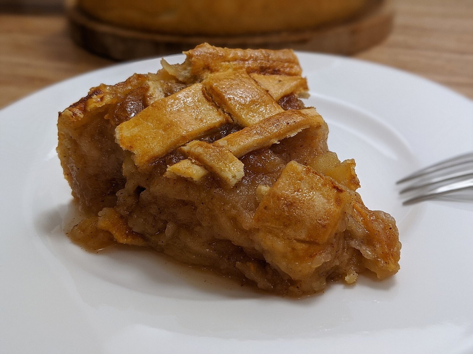 best apple varieties for caramel apple pie sliced on a board