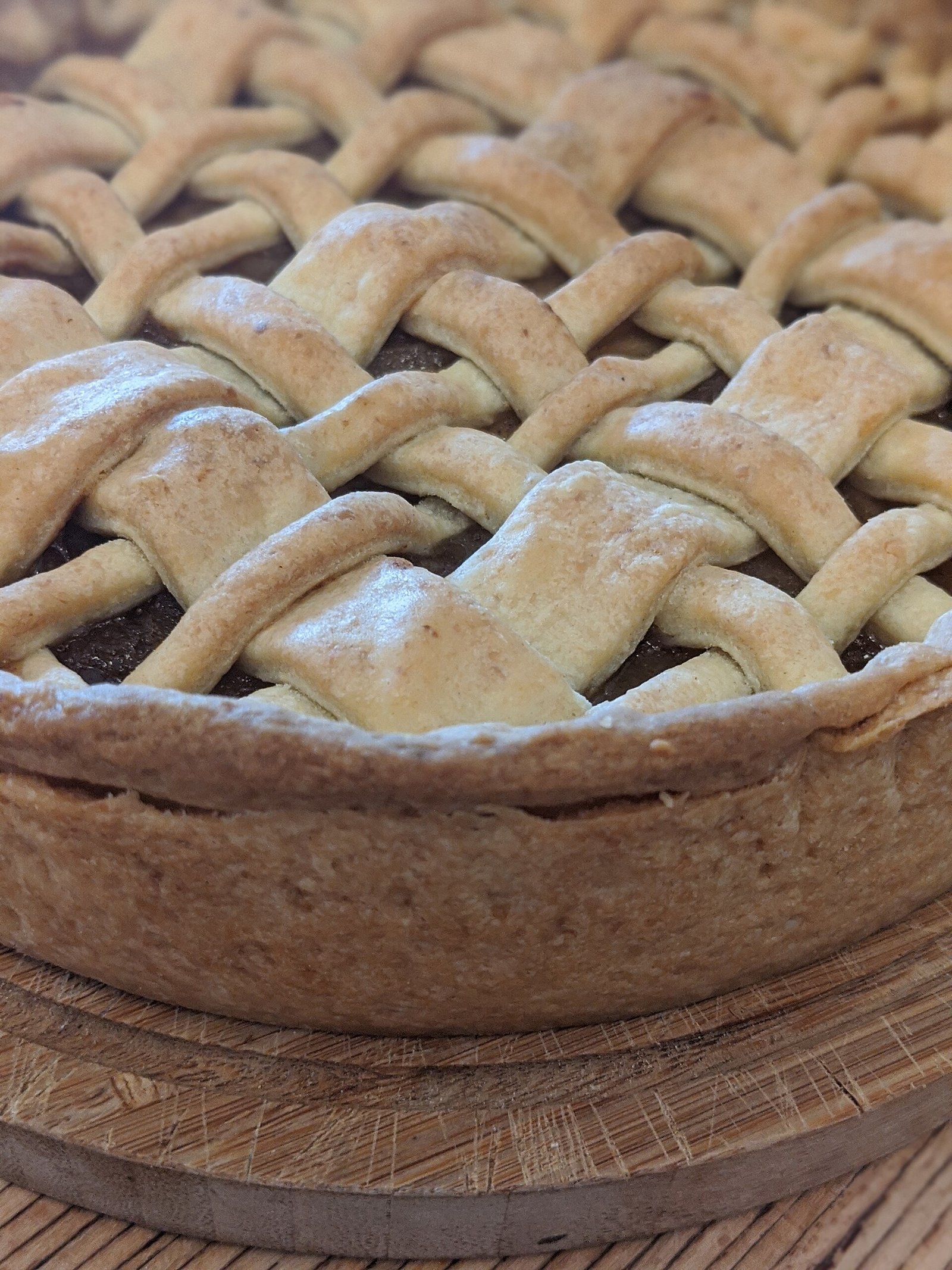crisp golden bottom crust of caramel apple pie slice