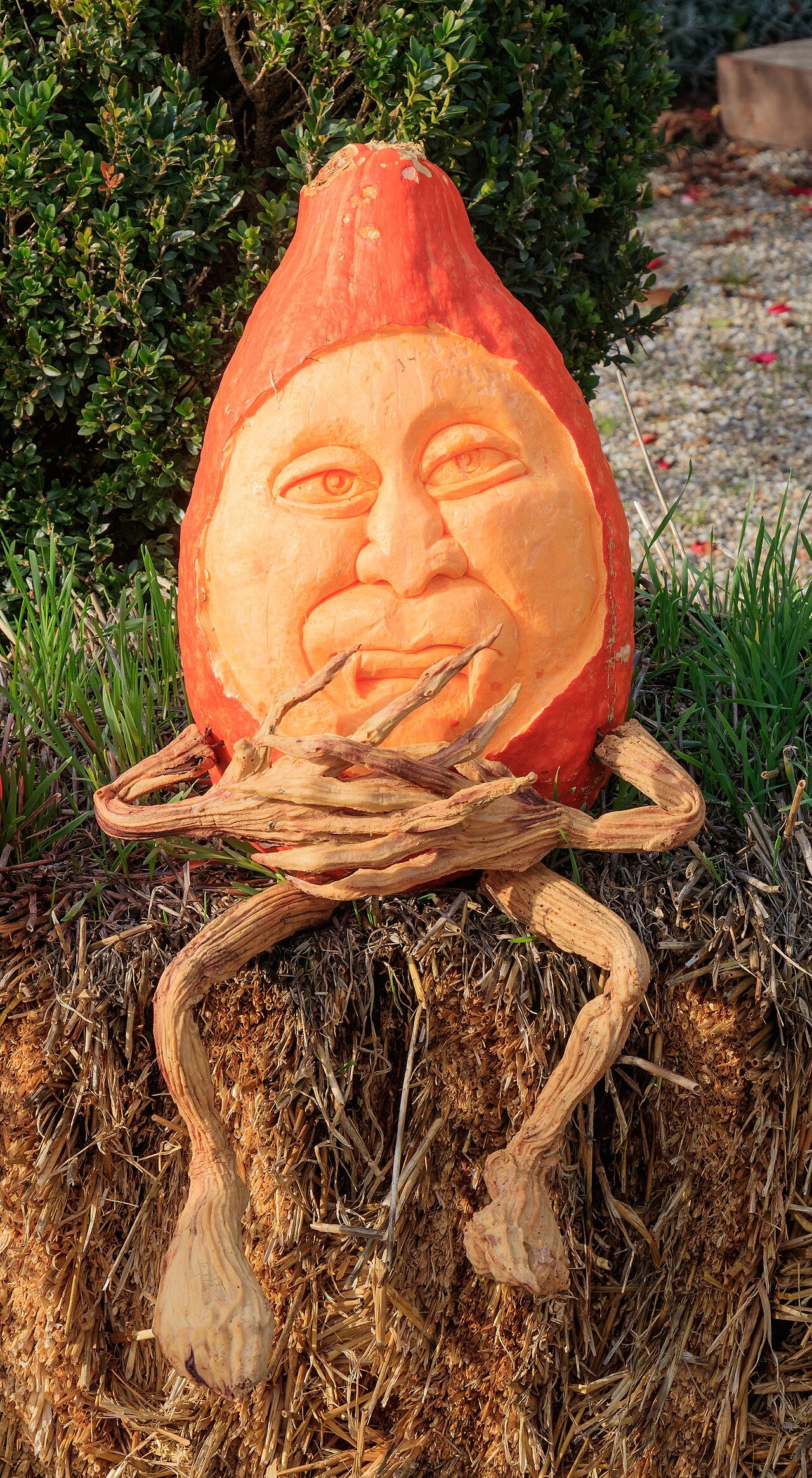 Classic carved jack-o'-lantern pumpkin glowing at night