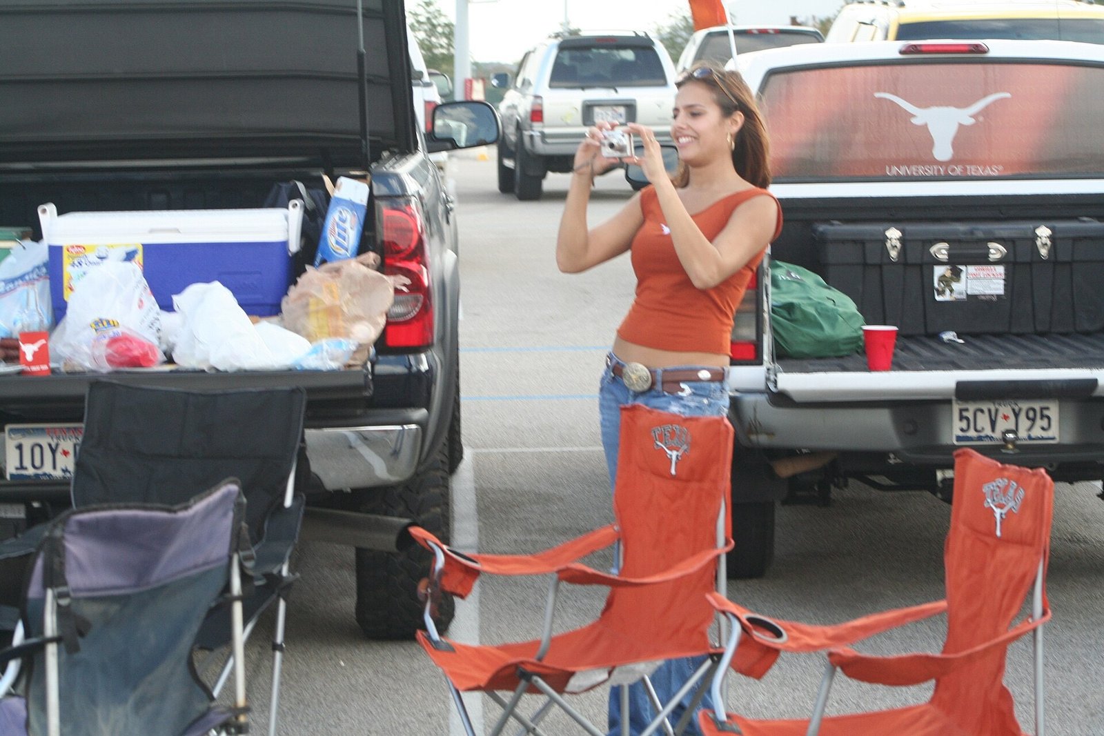 Tailgate snack spread with dips, wings and finger foods
