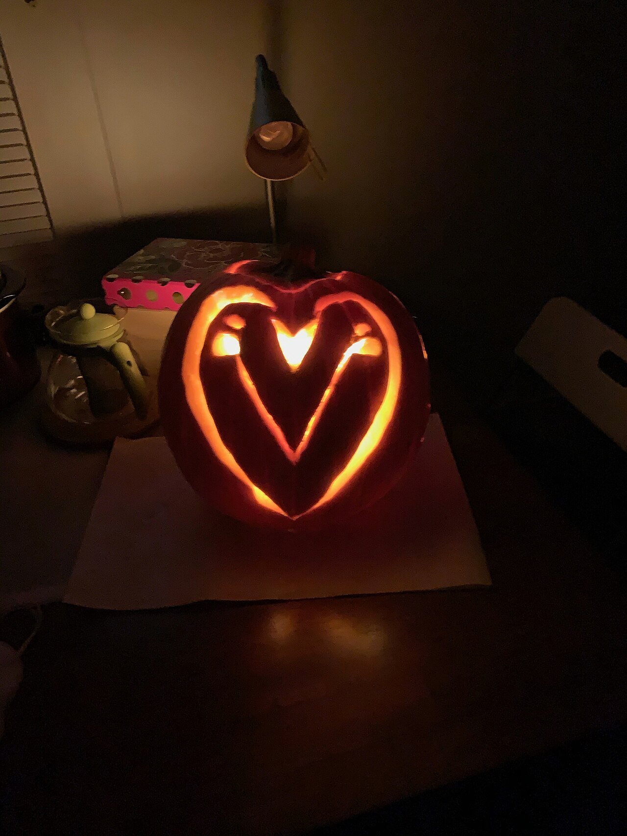 Intricately carved owl Halloween pumpkin lantern