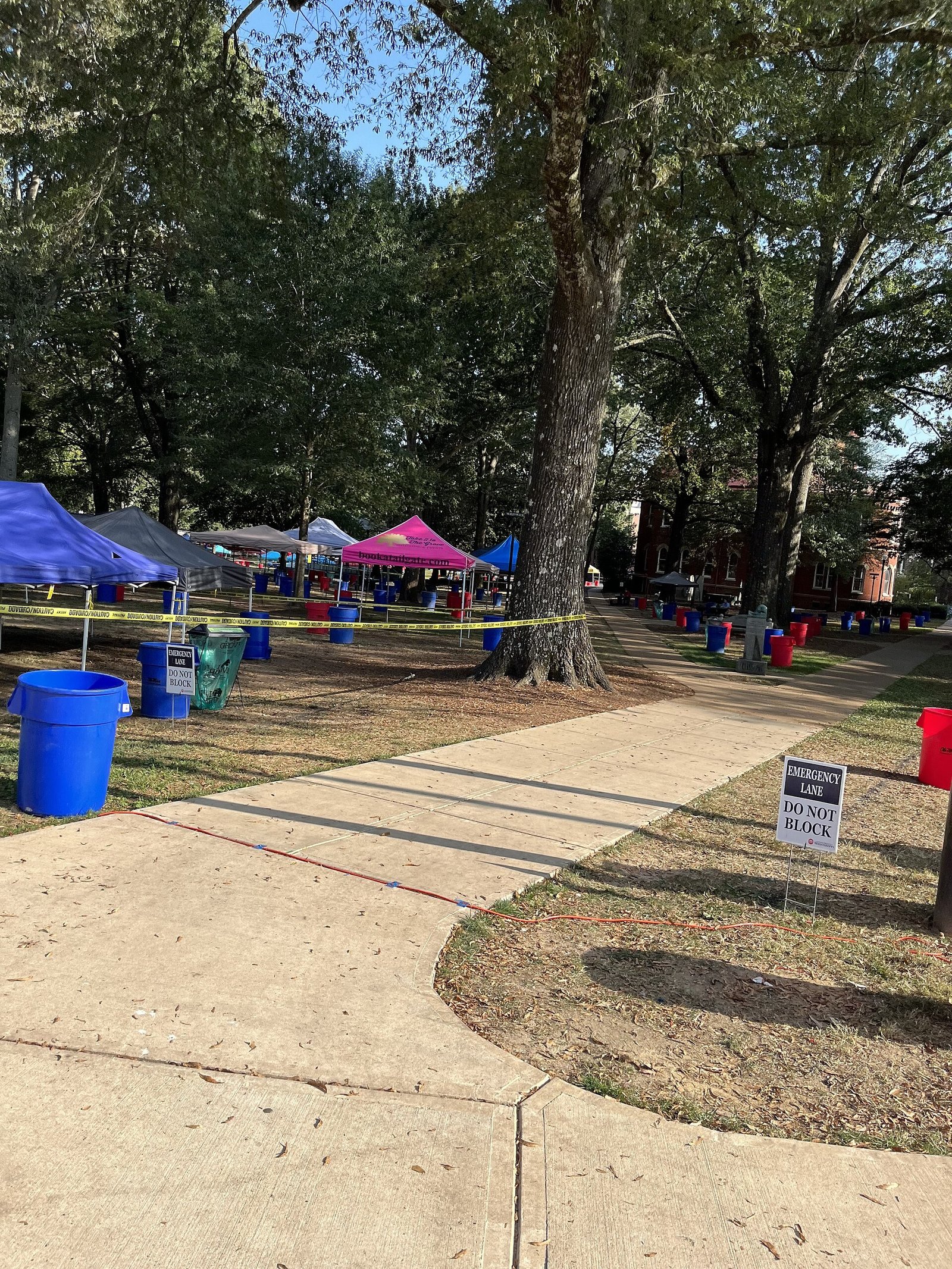 Comfortable folding chairs and blankets at a tailgate setup
