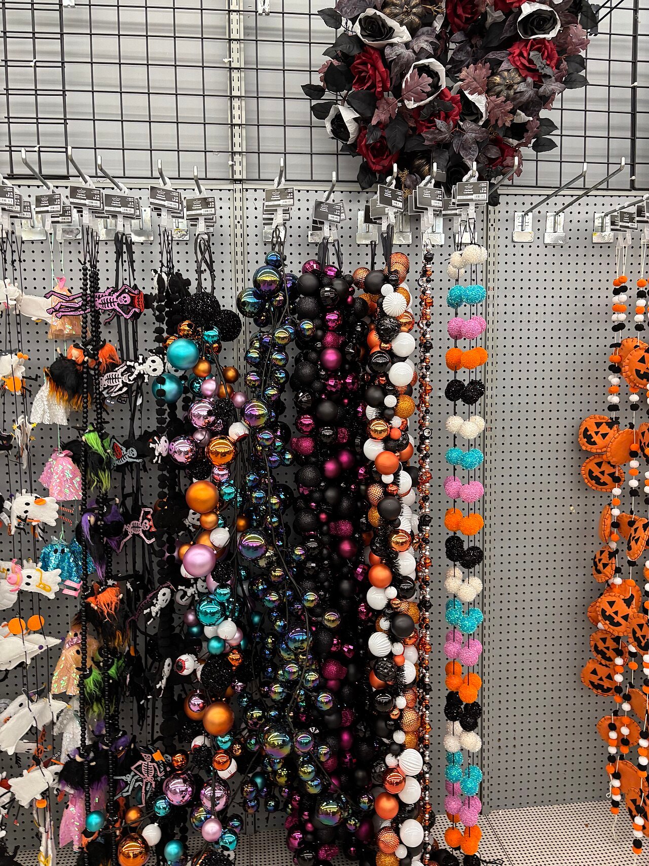 Halloween garland supplies including orange and black strands