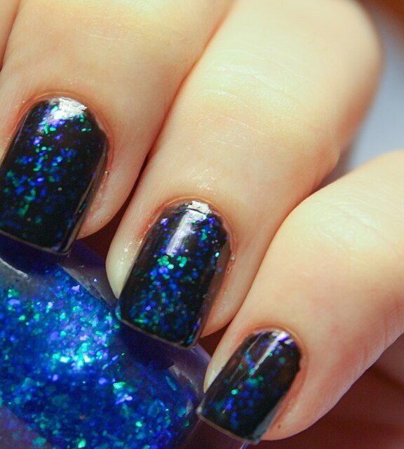 Hanukkah nails in silver, white, and teal colour combinations