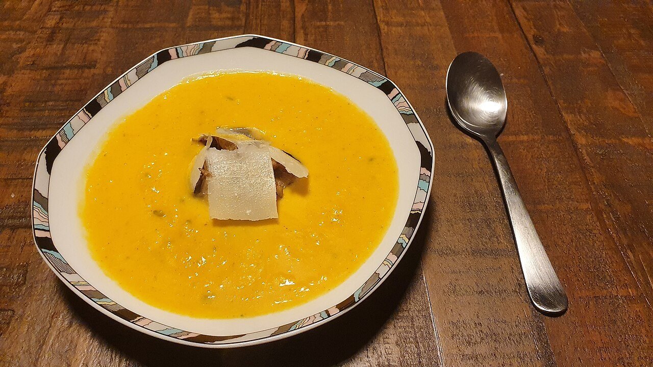 Pumpkin soup served in mini pumpkins