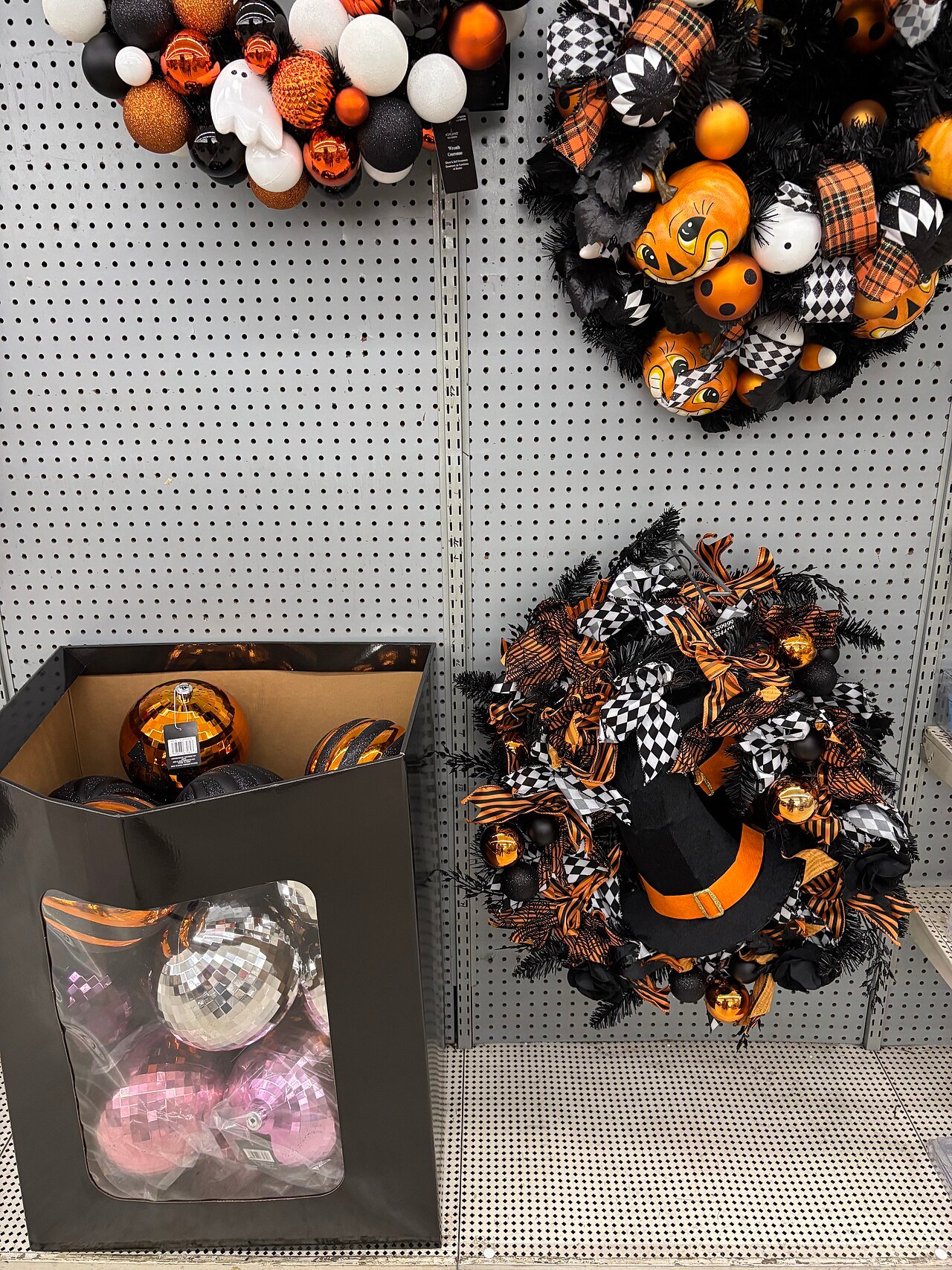 Halloween wreaths in seasonal orange and black colors