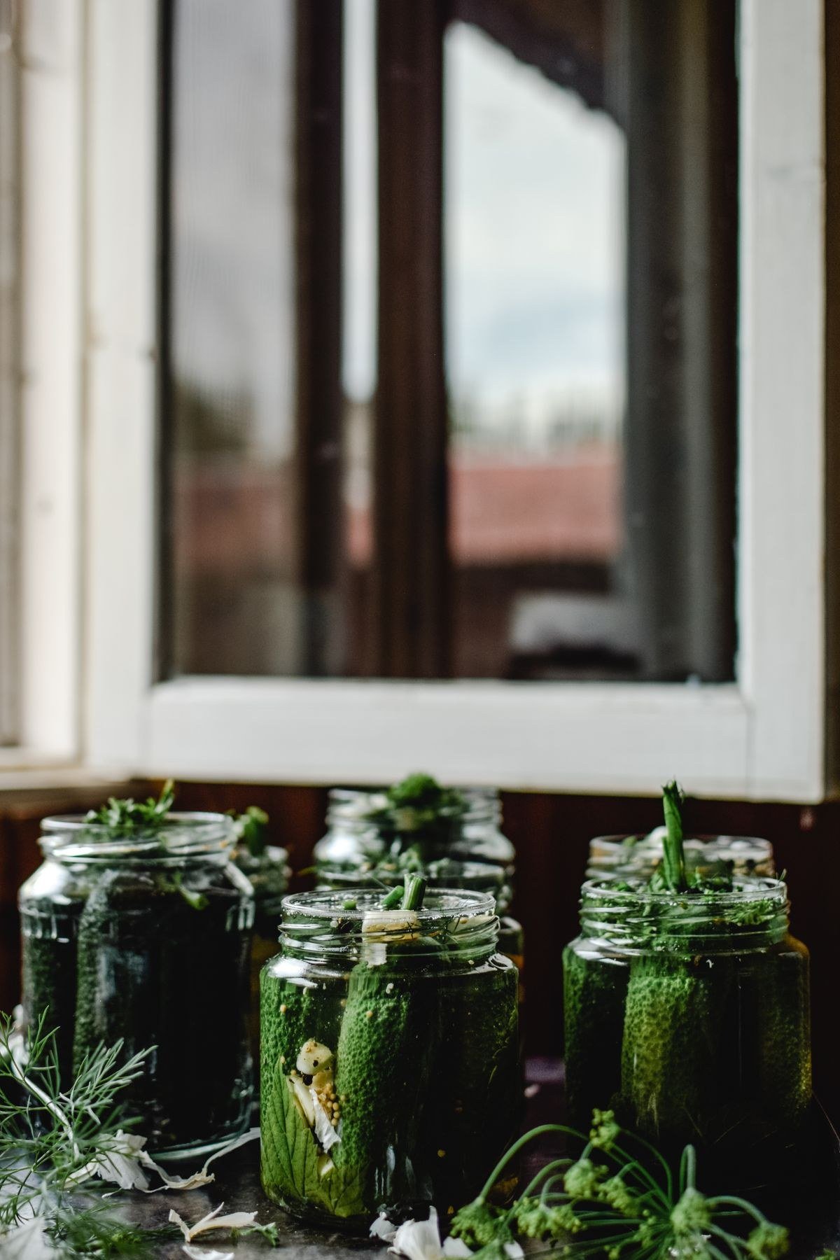 Pickling brine with vinegar, sugar, and whole spices simmering in a pot