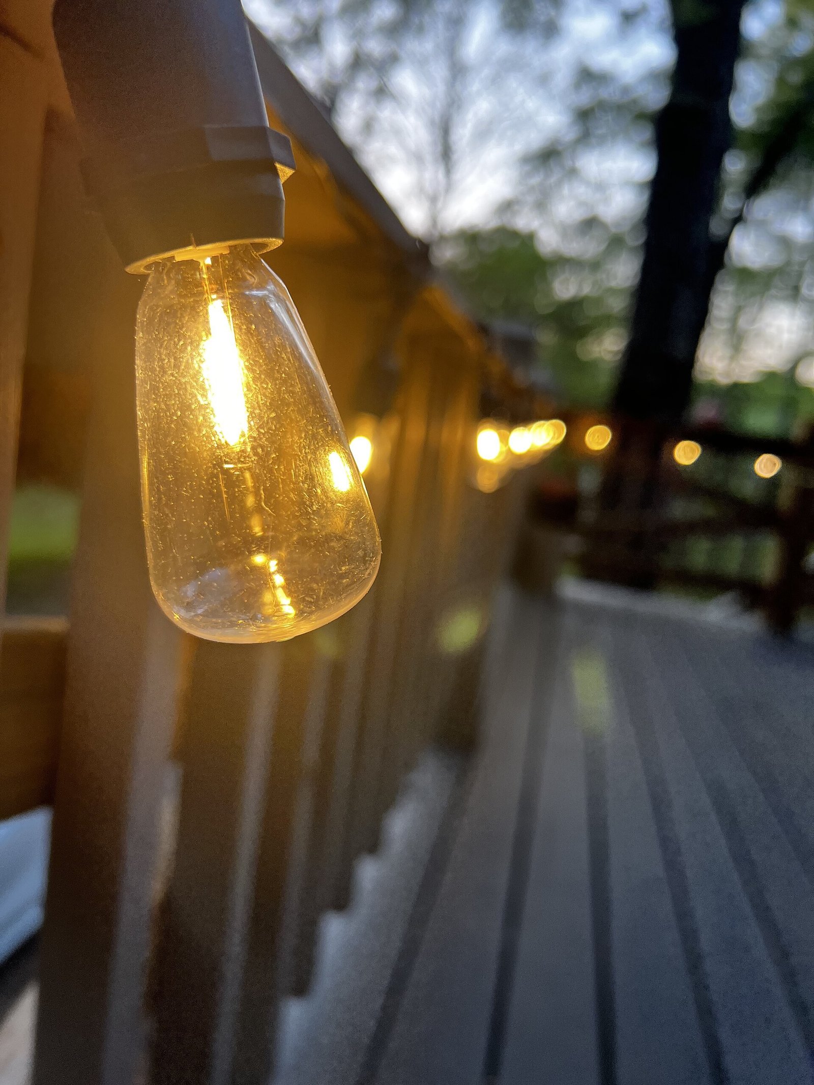 Warm step lights illuminating porch stairs safely at night