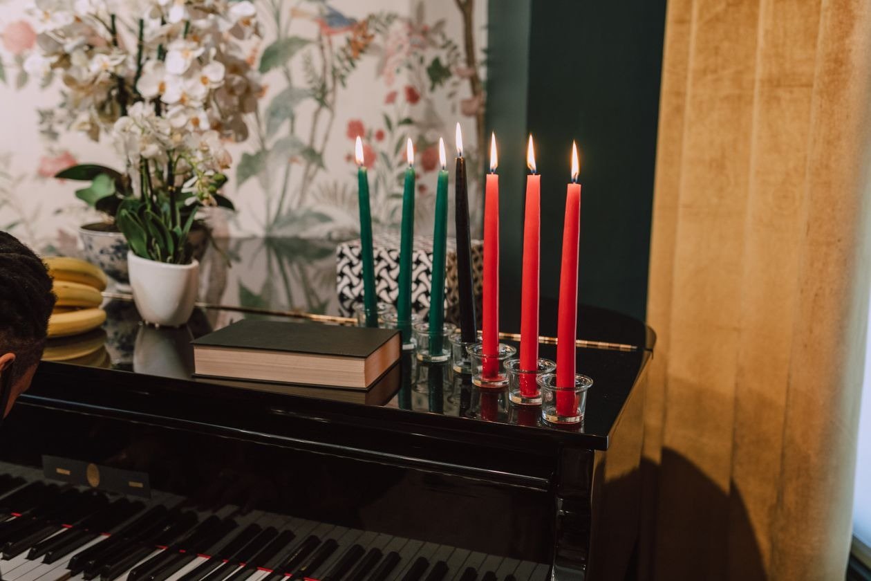 Welcoming Kwanzaa entryway with wreath and greenery