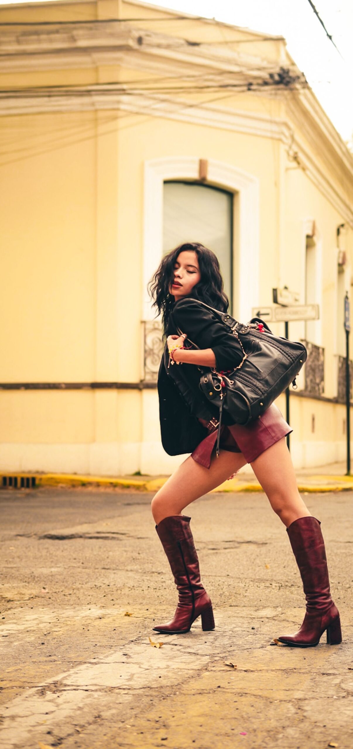 monochrome burgundy outfit with matching boots
