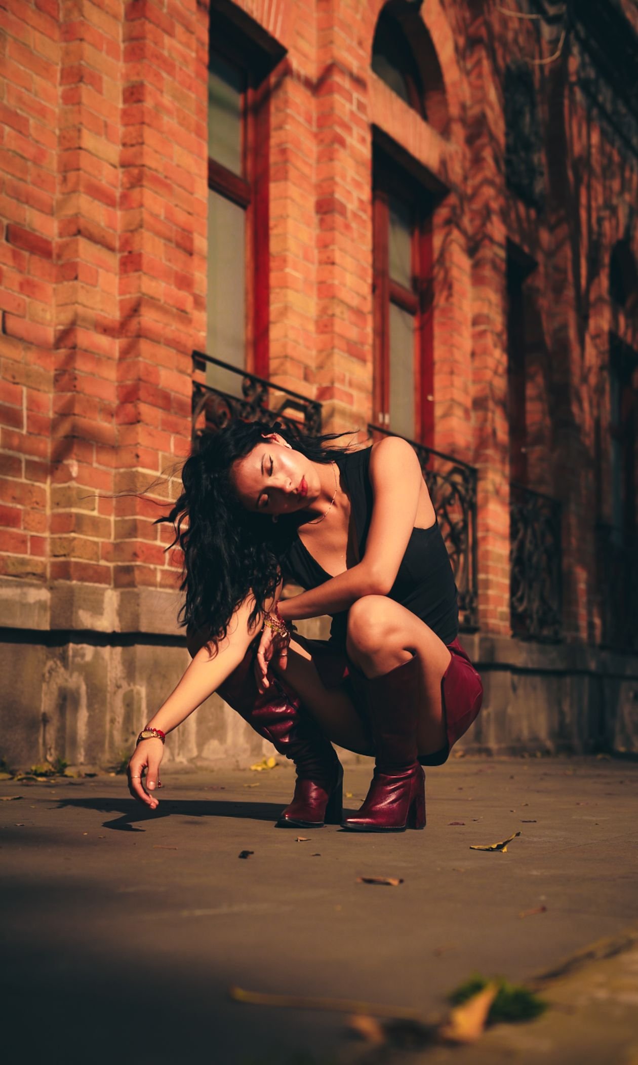 burgundy knee high boots styled for the office