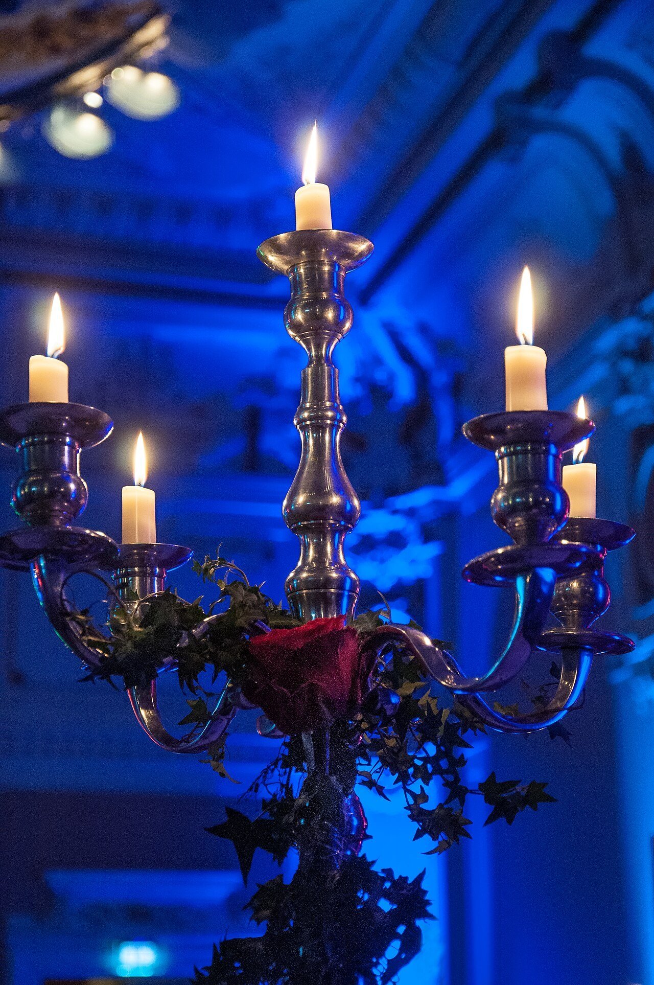 Ornate candelabra with lit candles