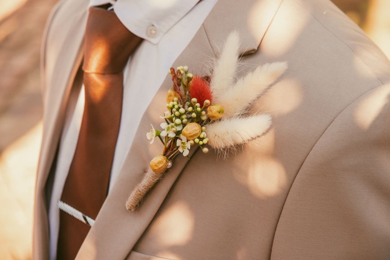 Silver and gold brooches for formal mens suits