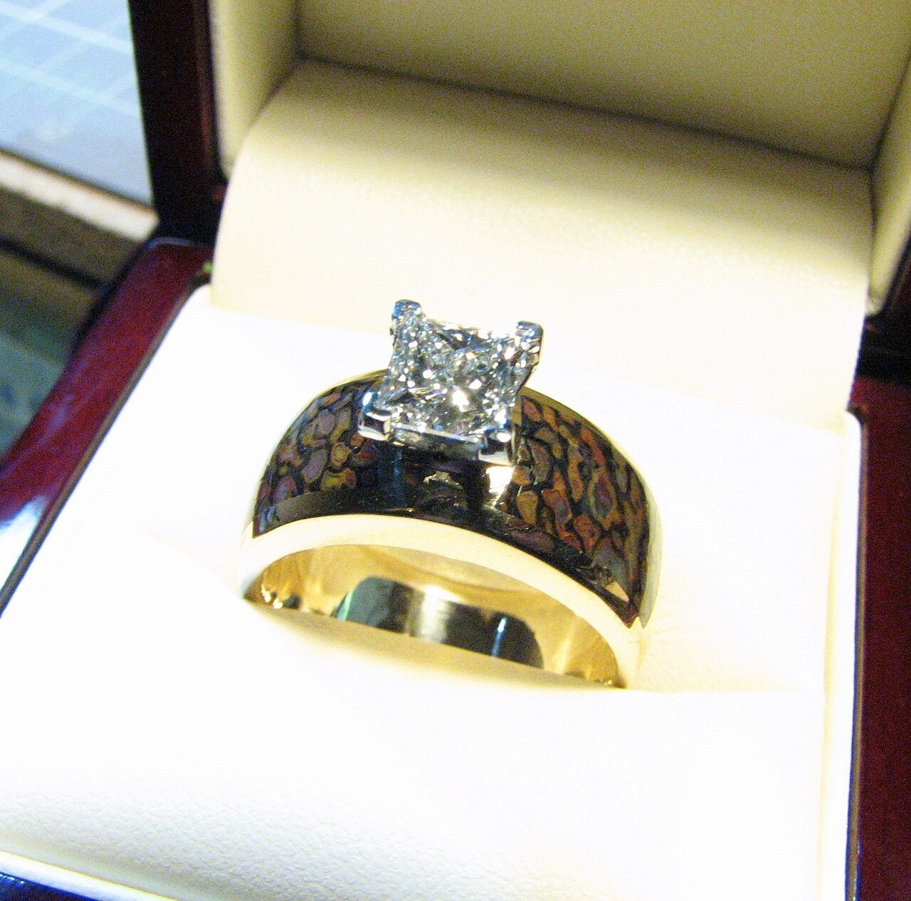 Diamond and gold wedding ring in a box