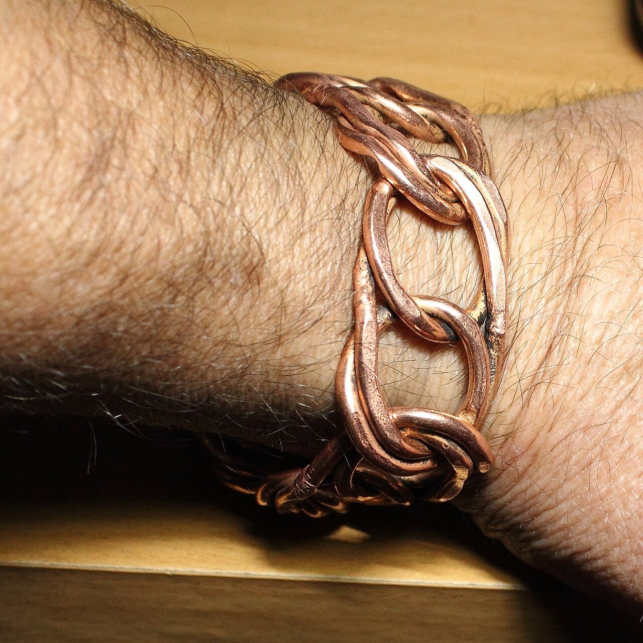 Copper bracelet on a wrist