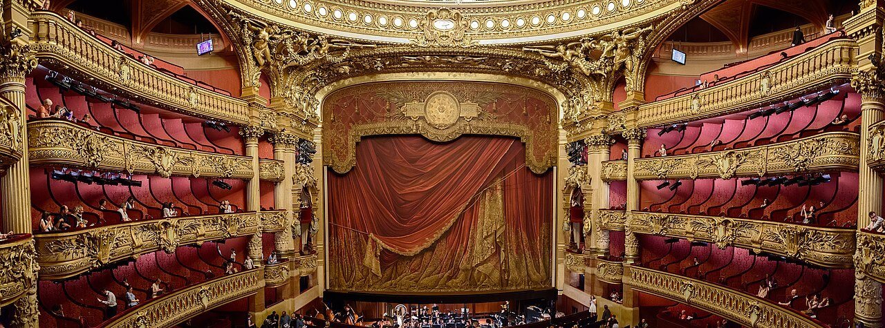 The gilded stage of the Opéra Garnier in Paris