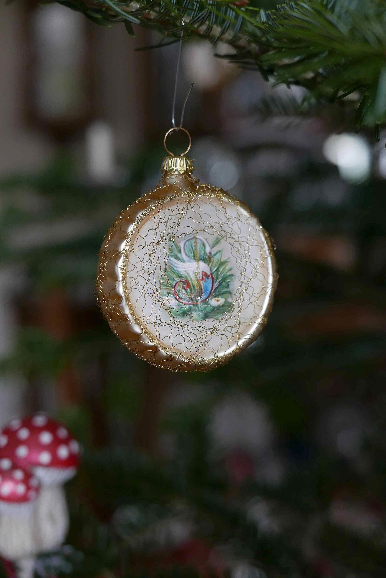 Assorted glass Christmas ornaments in festive colors