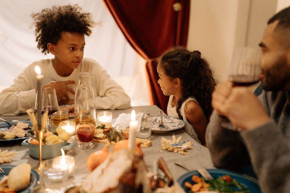 Children playing Thanksgiving games between courses at the kids table